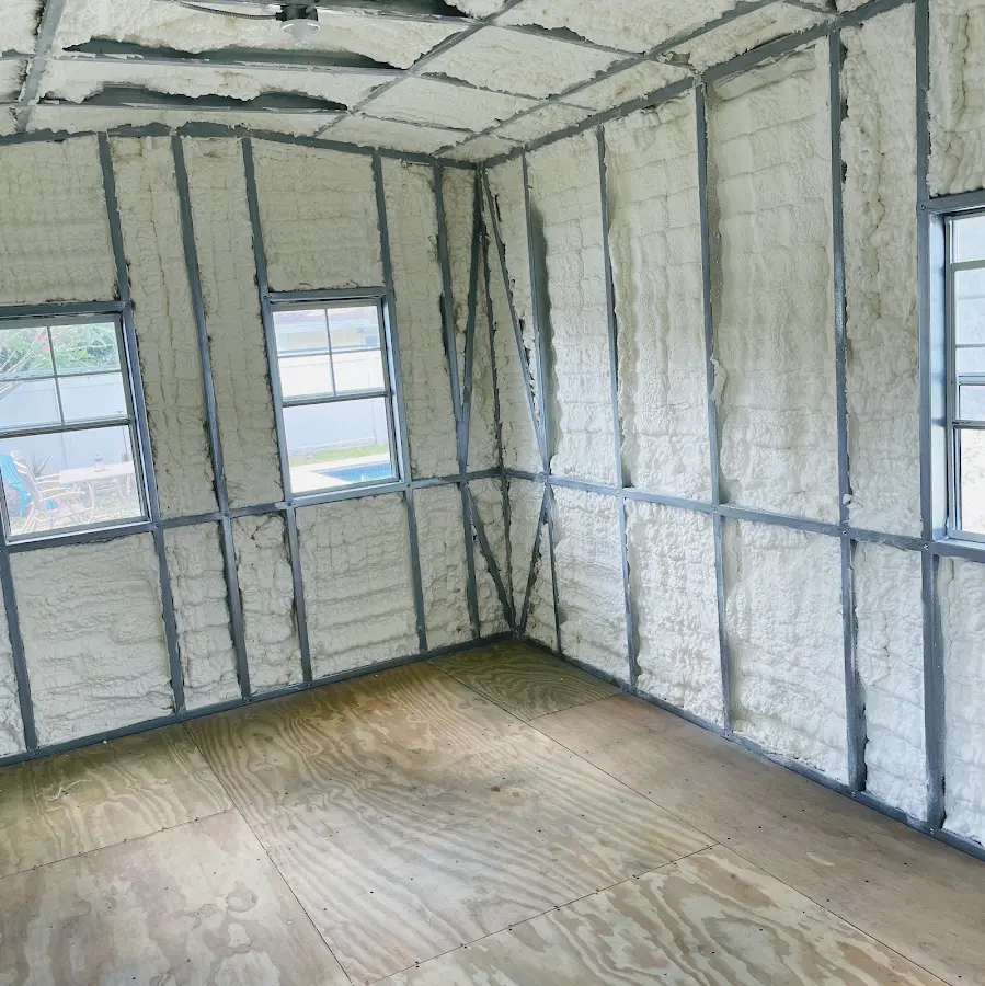 Closed-cell spray foam insulation applied to wall cavities in a residential project in Fairfield